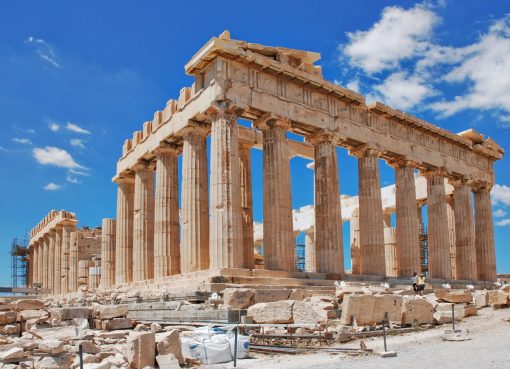 Athens: A Comprehensive Tour Guide Athens, the capital of Greece, is a city steeped in history and culture, known for its ancient landmarks, vibrant neighborhoods, and rich traditions. This guide aims to provide you with an overview of Athens, from its historical significance to modern-day attractions, ensuring you have an enriching experience. Introduction Athens is often referred to as the cradle of Western civilization and the birthplace of democracy. With a history spanning over 3,400 years, it is one of the world's oldest cities. The city's name is derived from Athena, the goddess of wisdom and war, who was revered by the ancient Greeks. Today, Athens is a bustling metropolis, blending the ancient with the modern, making it a unique destination for travelers. Historical Background Ancient Athens 1. The Golden Age (5th Century BC): This era marked the peak of Athenian power and cultural achievement. Under the leadership of Pericles, Athens flourished in arts, philosophy, and democracy. The construction of iconic structures like the Parthenon began during this time. 2. Philosophy and Arts: Athens was home to great philosophers such as Socrates, Plato, and Aristotle. The city became a center for arts and theater, with playwrights like Sophocles and Euripides creating timeless works. 3. The Roman Era: After being conquered by the Romans in 146 BC, Athens retained its cultural significance. The Romans admired Greek art and philosophy, leading to the continued flourishing of Athenian culture. Modern Athens 1. 19th Century: Athens was declared the capital of Greece in 1834. Significant efforts were made to restore ancient monuments and build new structures that reflect the city’s historical heritage. 2. 20th Century to Present: The city has faced various challenges, including World War II and economic crises. However, it has continuously evolved and modernized, becoming a vital cultural and economic hub in Europe. Major Attractions 1. The Acropolis The Acropolis is undoubtedly the crown jewel of Athens. This ancient citadel overlooks the city and is home to several significant structures, including: • The Parthenon: Dedicated to Athena, this temple is an architectural marvel and a symbol of ancient Greece. Its Doric columns and exquisite sculptures showcase the height of classical art. • The Erechtheion: Known for its Caryatids, the Erechtheion was a temple dedicated to Athena and Poseidon. The building’s asymmetrical design reflects the uneven terrain of the Acropolis. • The Temple of Athena Nike: This small temple, dedicated to the goddesses of victory, is famous for its elegant Ionic design and friezes depicting historical battles. 2. The Acropolis Museum Located at the foot of the Acropolis, the Acropolis Museum is a modern architectural masterpiece. It houses a vast collection of artifacts from the Acropolis, including sculptures, pottery, and everyday items from ancient Athens. The museum's glass floors provide a glimpse of the archaeological site beneath, enhancing the visitor experience. 3. The Ancient Agora The Ancient Agora was the heart of public life in ancient Athens. Visitors can explore its ruins, including the Temple of Hephaestus, one of the best-preserved temples from ancient Greece. The site also features the Stoa of Attalos, which has been reconstructed and serves as a museum showcasing artifacts from the Agora. 4. Plaka and Monastiraki Plaka is the historic neighborhood of Athens, characterized by its narrow streets, neoclassical architecture, and vibrant atmosphere. Here, you can find numerous tavernas, shops, and cafes. Monastiraki is famous for its flea market, where visitors can hunt for unique souvenirs, antiques, and local crafts. The square is also home to the impressive Tzistarakis Mosque and the Ancient Agora. 5. Syntagma Square Syntagma Square is the central square of Athens and a significant hub for political and social events. The square is home to the Greek Parliament building, where you can witness the Changing of the Guard ceremony at the Tomb of the Unknown Soldier. This colorful ceremony features the Evzones, the traditional Greek guards, dressed in their distinctive uniforms. 6. National Archaeological Museum This museum is one of the most important archaeological museums in the world, showcasing artifacts from various periods of Greek history. Highlights include the Mask of Agamemnon, ancient sculptures, and a vast collection of pottery and jewelry. 7. Mount Lycabettus For breathtaking panoramic views of Athens, a hike or a funicular ride up Mount Lycabettus is a must. At the summit, visitors can enjoy stunning vistas of the Acropolis, the Aegean Sea, and the sprawling city below. There is also a charming chapel, Agios Georgios, and a restaurant at the top. 8. Temple of Olympian Zeus Once one of the largest temples in the ancient world, the Temple of Olympian Zeus took over 600 years to complete. Today, only a few columns remain standing, but the site is still impressive and offers insight into the grandeur of ancient Greek architecture. Culture and Cuisine Greek Culture Athens is a melting pot of cultures, with influences from its rich history, modern art, and vibrant lifestyle. The city hosts various cultural events, including music festivals, art exhibitions, and theatrical performances. The annual Athens Epidaurus Festival showcases ancient Greek plays and modern performances in historical venues. Traditional Cuisine Greek cuisine is famous for its flavors and use of fresh ingredients. When in Athens, be sure to try: • Moussaka: A layered dish made with eggplant, minced meat, and béchamel sauce. • Souvlaki: Grilled meat skewers, often served with pita and tzatziki sauce. • Dolmades: Grape leaves stuffed with rice, herbs, and occasionally meat. • Baklava: A sweet pastry made with layers of filo dough, nuts, and honey syrup. Local tavernas and street vendors offer authentic culinary experiences that allow visitors to indulge in traditional Greek dishes. Practical Information for Travelers Getting There Athens International Airport (Eleftherios Venizelos) is well-connected to major cities around the world. From the airport, you can reach the city center via metro, bus, or taxi. Transportation • Metro: The Athens Metro is an efficient and affordable way to get around the city. It connects major attractions and neighborhoods. • Buses and Taxis: Public buses cover areas not served by the metro. Taxis are also available, but it's advisable to confirm the fare before starting your journey. • Walking: Many of Athens' attractions are within walking distance of each other, especially in the historical center. Best Time to Visit The best times to visit Athens are during the spring (April to June) and fall (September to November) when the weather is pleasant, and tourist crowds are smaller. Summer can be hot, making sightseeing less enjoyable, but it’s also when many cultural events take place. Safety Tips Athens is generally safe for tourists, but it's wise to take standard precautions: • Keep an eye on your belongings in crowded areas. • Avoid poorly lit streets at night. • Be cautious of scams targeting tourists. Language and Communication The official language is Greek, but English is widely spoken, especially in tourist areas. Learning a few basic Greek phrases can enhance your experience and interactions with locals. Currency and Payments The currency used in Greece is the Euro (€). Credit cards are widely accepted, but it’s a good idea to carry some cash, especially for small purchases and in local markets. Conclusion Athens is a city where ancient history meets modern life. From its breathtaking archaeological sites to its vibrant neighborhoods, there’s no shortage of experiences to be had. Whether you’re exploring the ruins of the Acropolis, savoring traditional Greek cuisine, or wandering through bustling markets, Athens promises an unforgettable journey through time and culture. With its rich heritage and lively atmosphere, Athens is a destination that will leave a lasting impression on every traveler. ________________________________________ This guide serves as a starting point for exploring Athens, ensuring you have a comprehensive understanding of what this remarkable city has to offer. Enjoy your trip!